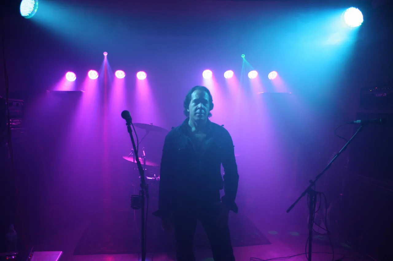 Lou Manero, bassist of the band Motor and owner and engineer of Lights, Action, Music Studios, performing live on stage